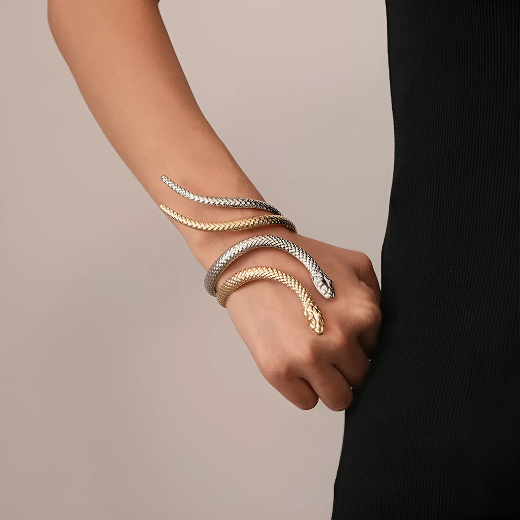 Gold and silver tone snake motif ring and bracelet set with twisted winding design
