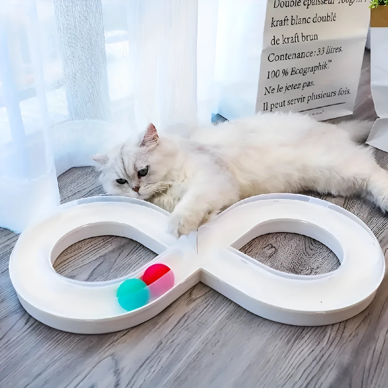 Blue and white plastic cat toy set with turntable track, tease sticks, and balls on a 50cm base