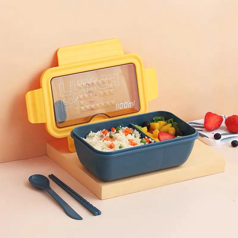 Green partitioned bento box with four compartments showing 20.5 cm plastic lunch container