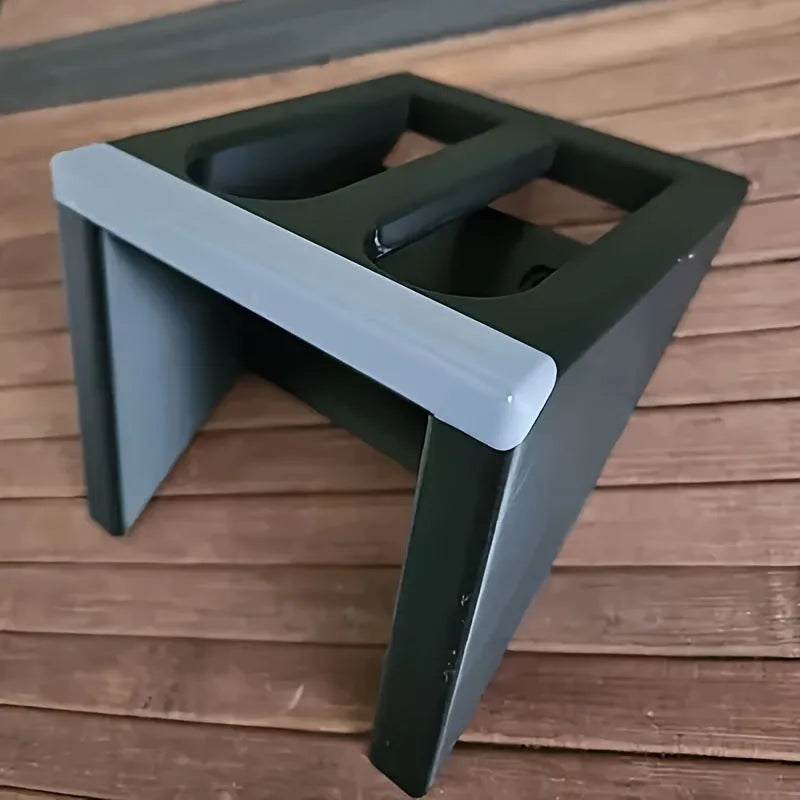Black plastic pistol display stand with punk-style design measuring 10.85 by 7.6 centimetres