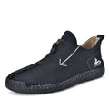 Men's black zip-up casual leather boots with round toe and hand-stitched rubber sole.
