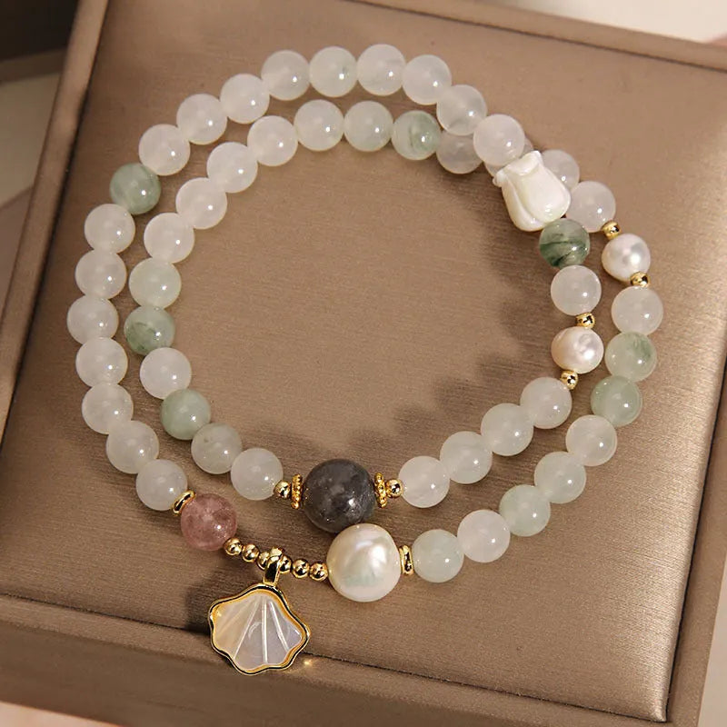Crystal bracelet with Tianshan jade ginkgo leaf pendant, gold-plated inlay, and rhinestone details