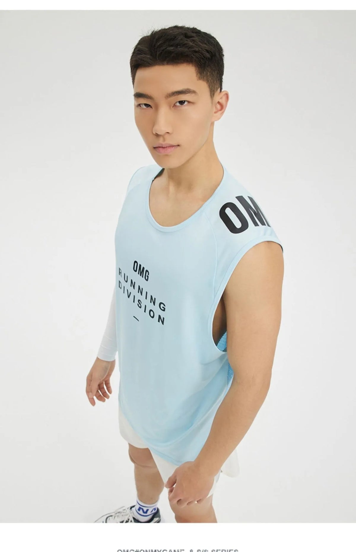 Men's lightweight mesh sports vest in blue colour on a hanger, showing loose fit and straight hem design.