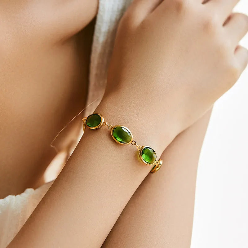 Geometric ellipse bracelet in 18K copper with blue glass inlay embroidery