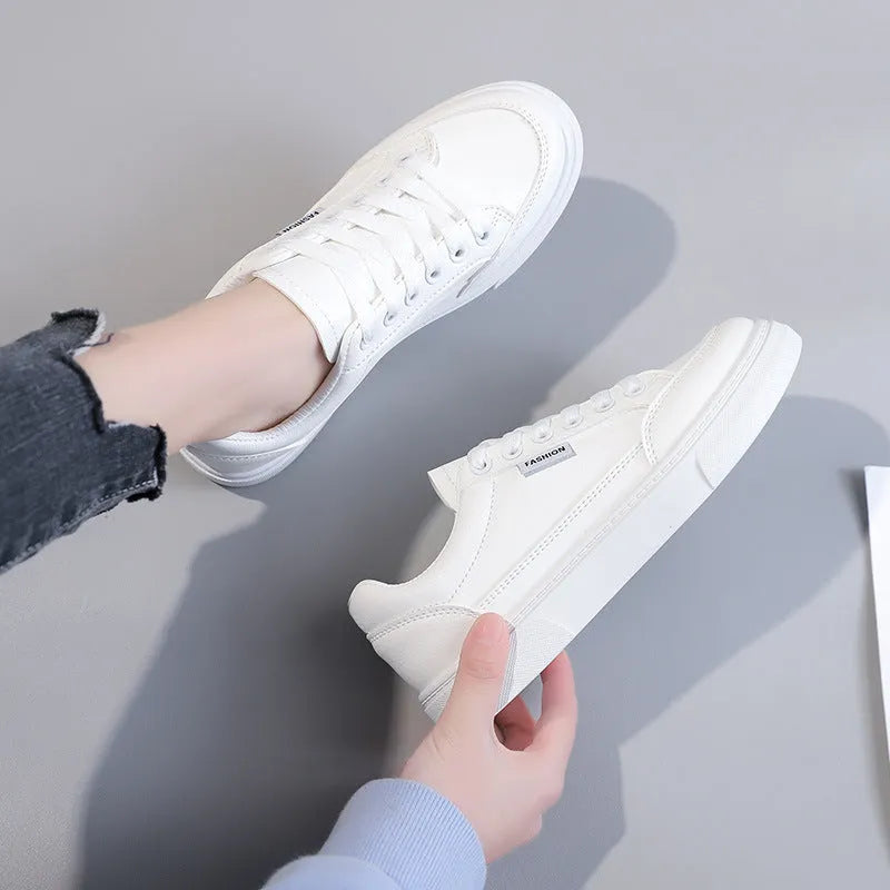 Korean style women's low-top sneakers in white and brown colours with artificial PU upper