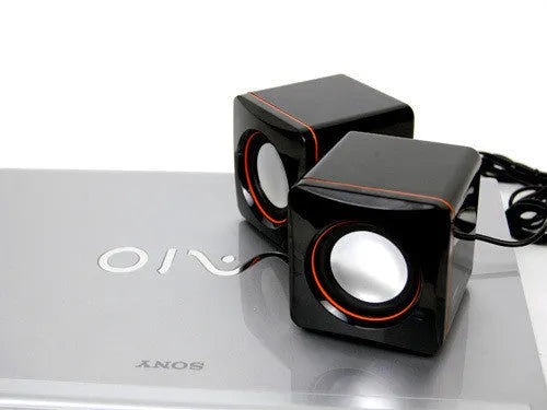 Small black square USB-powered 2.0 computer speaker for desktop placement