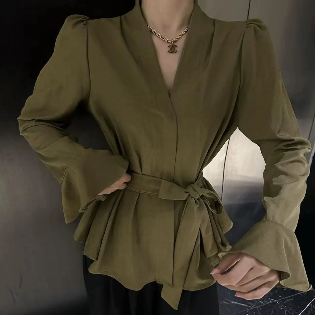 Women's French-style irregular collar long sleeve shirt with bell sleeves in wine red.