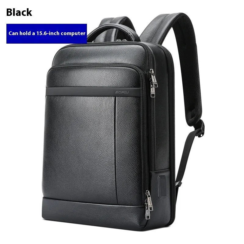 Black men's genuine leather commuter backpack with USB port and sewing line detail.