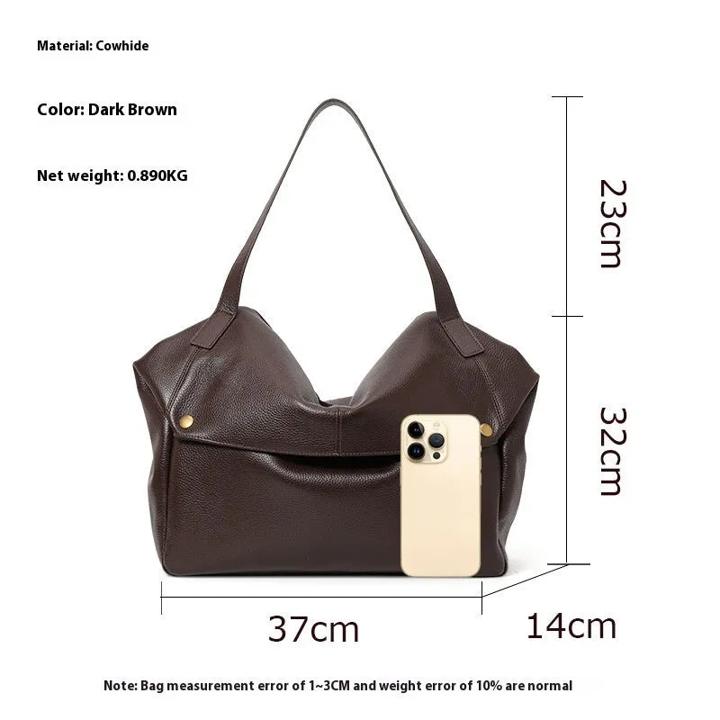 Brown genuine leather women's commuter shoulder bag with horizontal square shape showing internal zippered compartment