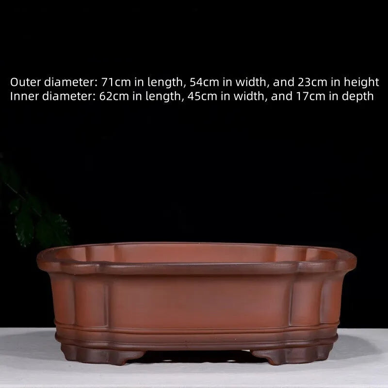Large antique-look purple clay flowerpot with Chinese tree stump and floral patterns.