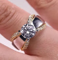 Geometric two-tone brass ring with nickel-free white steel plating on model hand