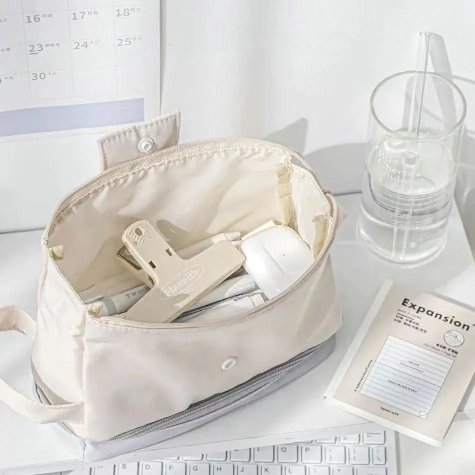 Polyester folding double layer pencil case in beige, blue or navy blue with organised compartments for stationery storage