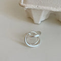 Geometric open ring with three-dimensional interlaced matte metal design and gold electroplating