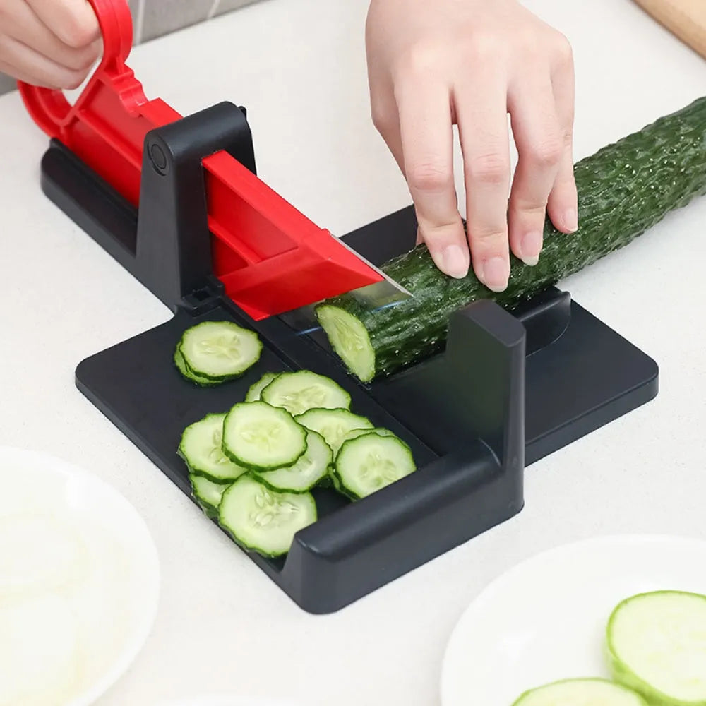 Green and red vegetable cutter with stainless steel blade for slicing carrots and potatoes