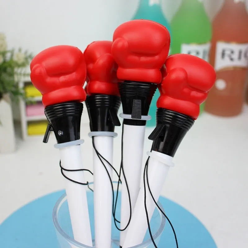 Four pressure relief boxing pens with black ink and 0.7mm bullet tips showing plug-in sleeve design