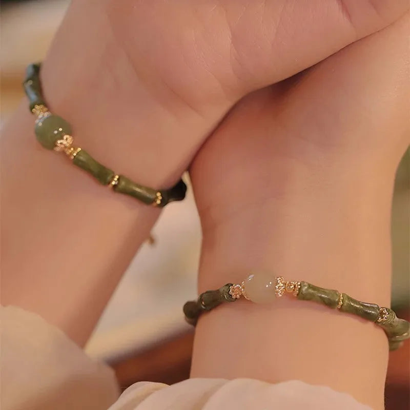 Geometric Hetian jade bracelet for women in dark green or light colour with round design elements
