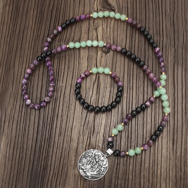 Yoga lotus pendant necklace and bracelet set with stone beads and geometric alloy pendant on adjustable chain.