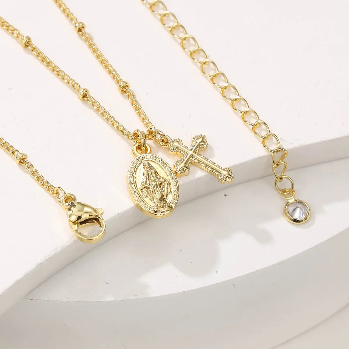 Gold geometric cross Virgin Mary necklace for women with simple chain
