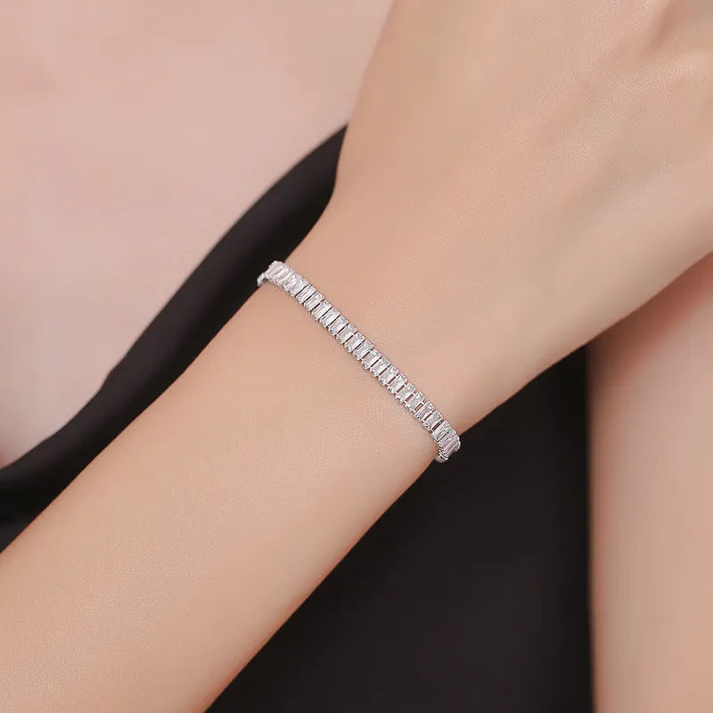 Rectangular brass bracelet with full diamond pattern from inlaid zircon treatment in champagne gold colour