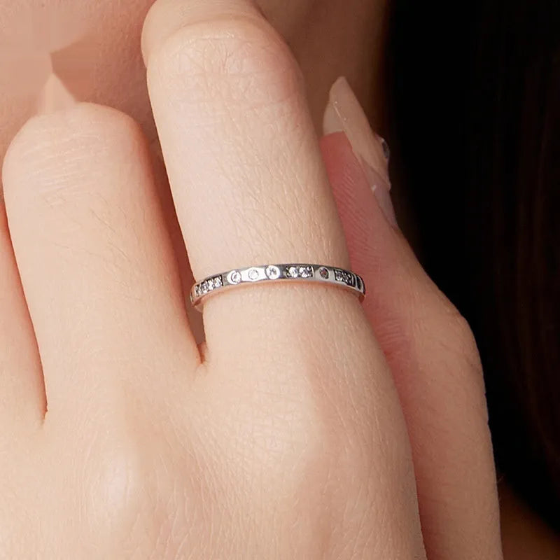 Silver Moss Password I Love You ring with oxidised black finish showing engraved text