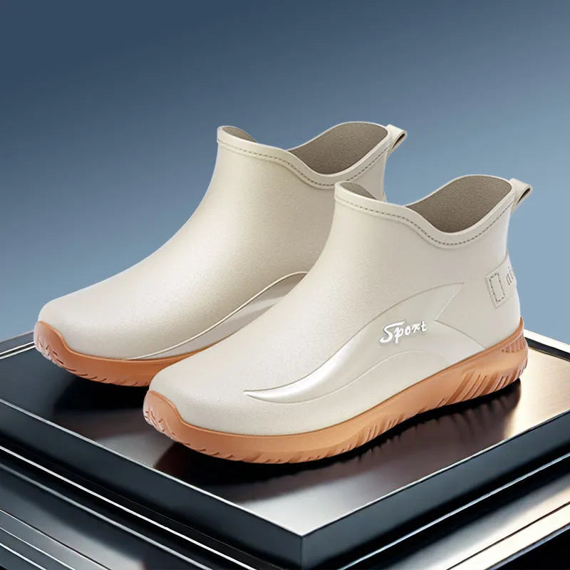 Men's short PVC rubber boots in beige, black, and black & red colours on a flat heel