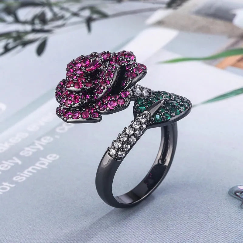 Geometric women's ring with red corundum stone and black gold finish