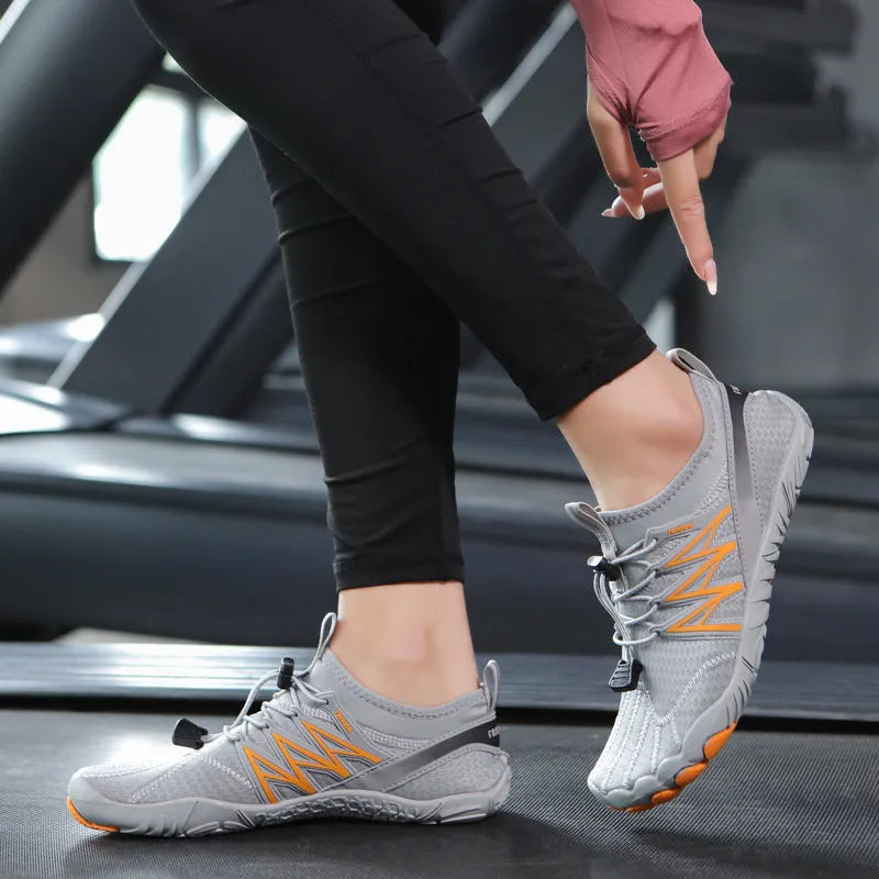 Lightweight non-slip training sneakers in multiple colours on a gym floor