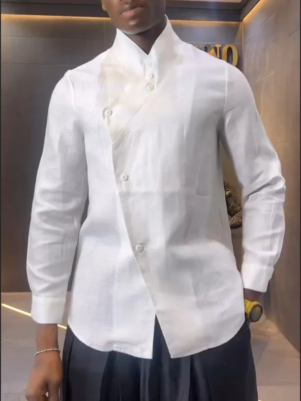 White asymmetric long sleeve shirt paired with black pleated pants in casual two-piece set