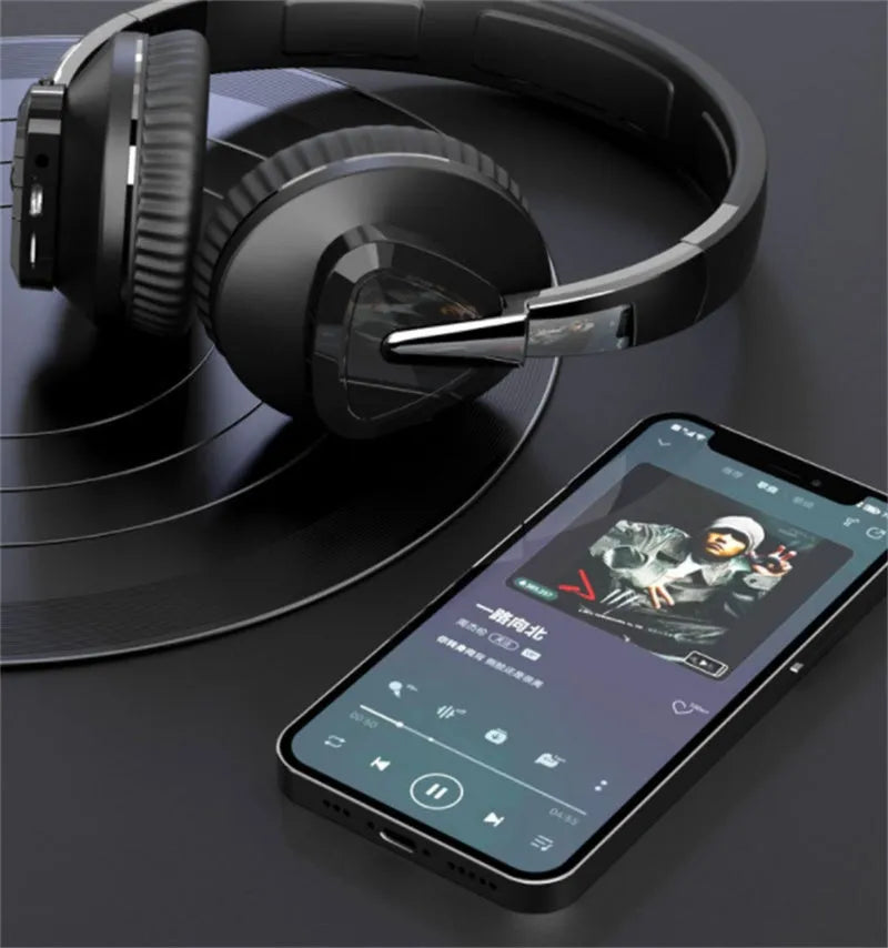 Wireless gaming headset with all-inclusive ear cushions in blue, showing AUX port and control buttons.