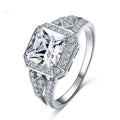 Women's platinum colour geometric zircon ring with hollow ornament design showing quadrilateral pattern