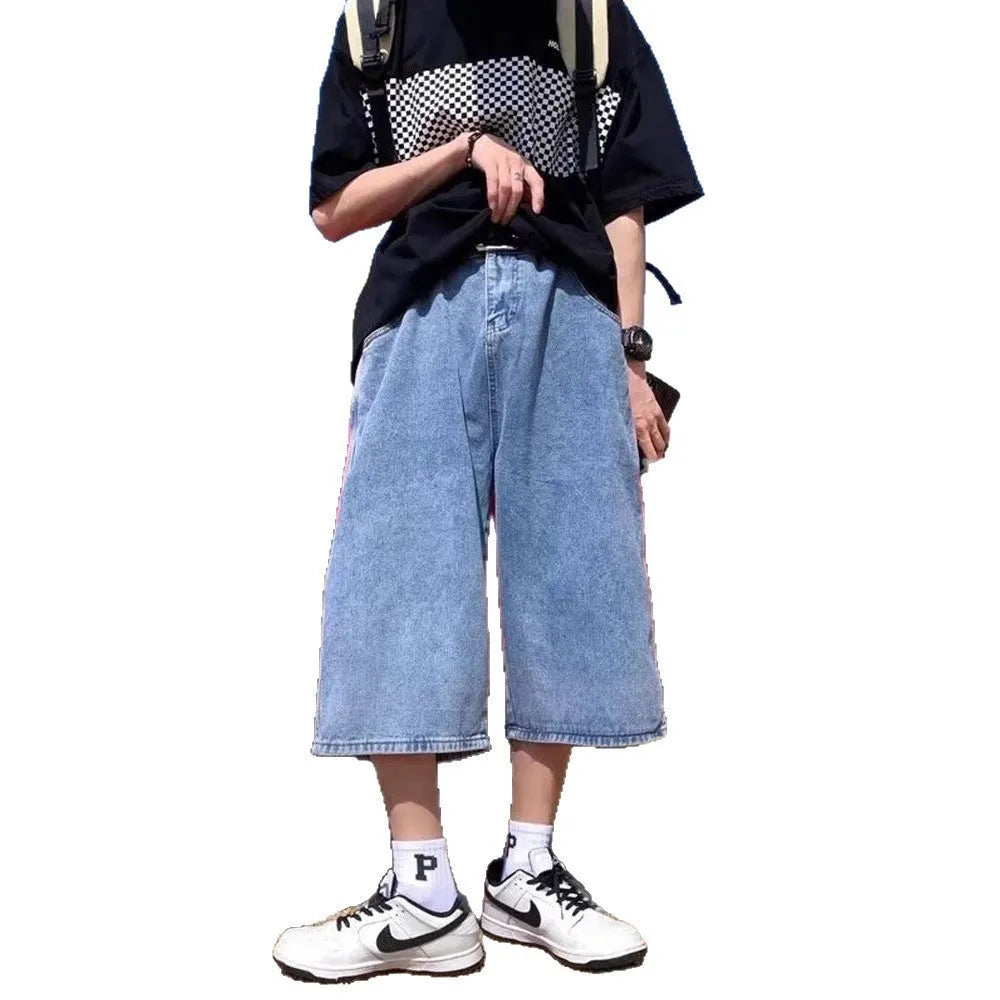 Blue men's cropped high waist denim pirate shorts on a neutral background