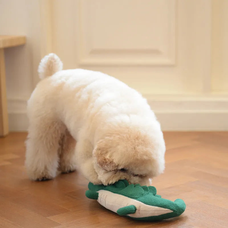 Green plush dog toy measuring 35cm long with soft texture for children's play