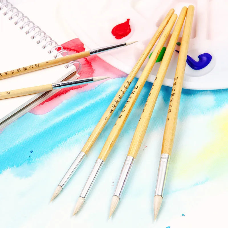 Six wooden-handled artist pen brushes with pointed wool hooks for detailed line work.