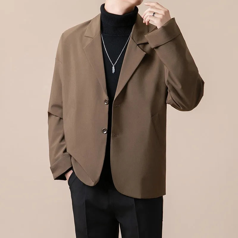 Men's loose fit casual suit jacket in light business style with regular length and long sleeves
