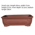 Purple clay rectangular flowerpot showing handmade ceramic texture and rectangular shape