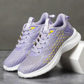 Women's lavender purple Flyknit running shoes with mesh lining and EVA sole, shown in a side view.