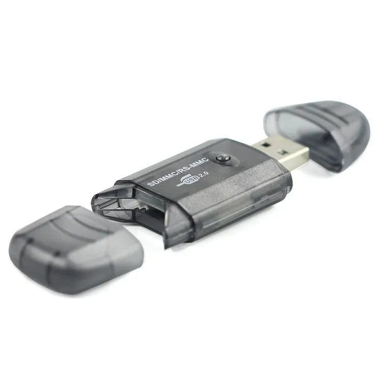 Transparent plastic USB card reader with LED light, showing memory card slots and USB connector.