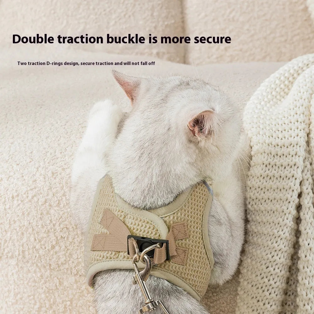 Cloth cat harness with chest strap and integrated hand holding rope in brown colour
