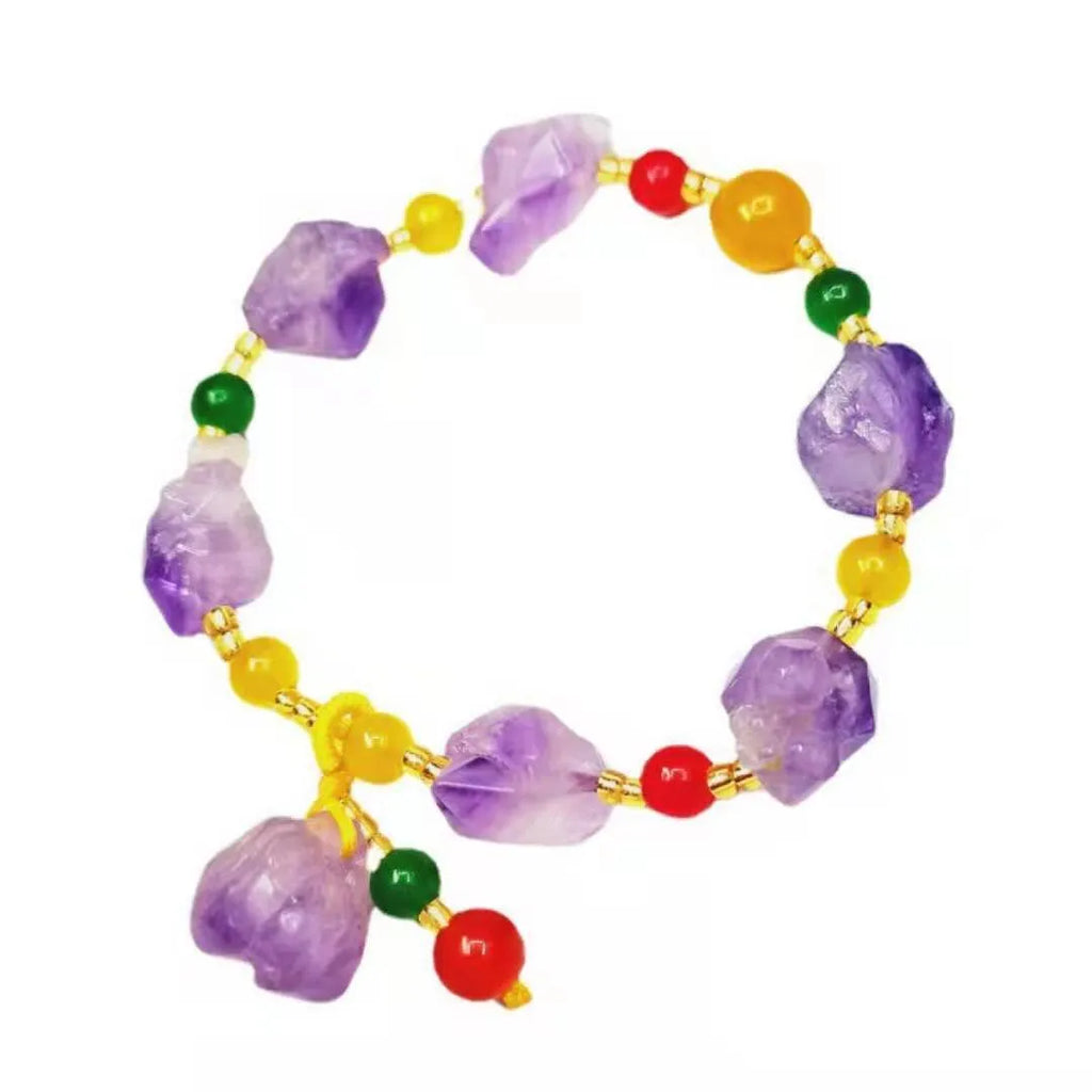 Women's amethyst bead bracelet with natural-shaped stones and fu character charm on adjustable beaded design