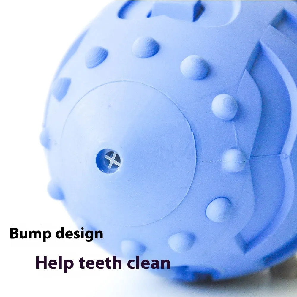 Light green thickened rubber rugby ball dog toy with squeaker for bite-resistant interactive training and teeth cleaning.