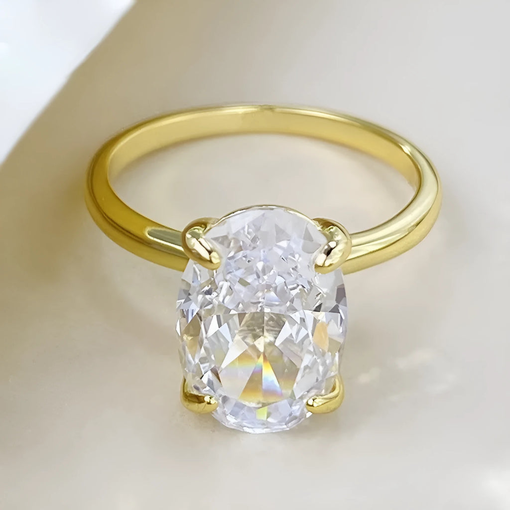 Oval gemstone ring in 925 silver with four-claw setting, showing 6x9mm centrepiece