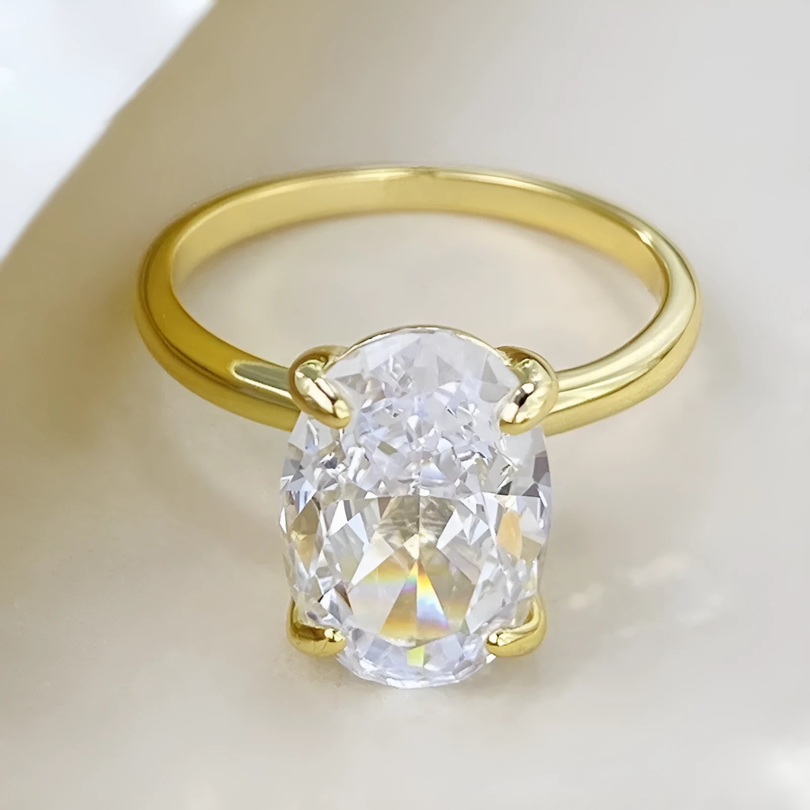 Oval gemstone ring in 925 silver with four-claw setting, showing 6x9mm centrepiece