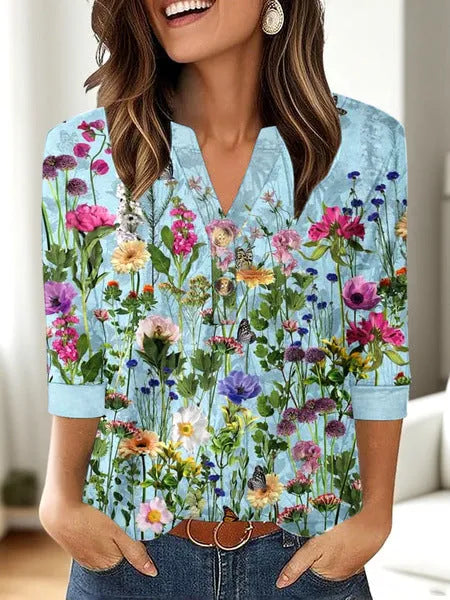 Women's loose-fit casual V-neck top with a 3D pattern print in various colour options.