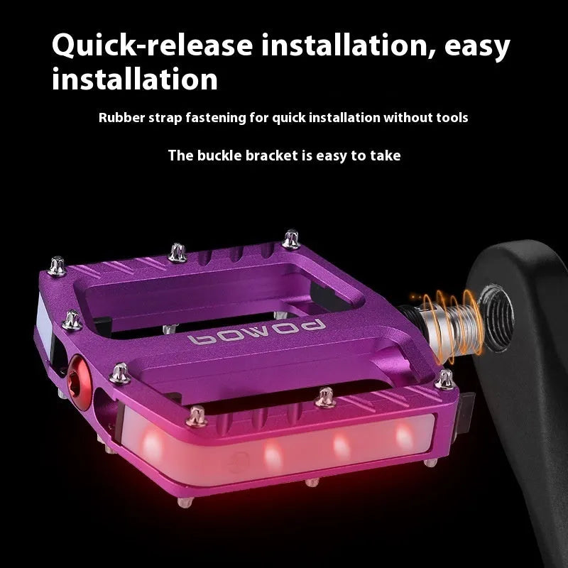 Bicycle pedal with integrated LED lights in aluminium alloy construction showing colour options