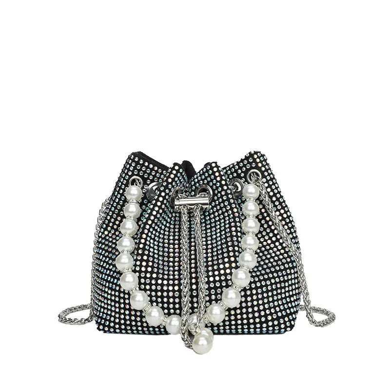 Women's fashion crossbody bag with diamond detailing and chain strap in soft PU material.