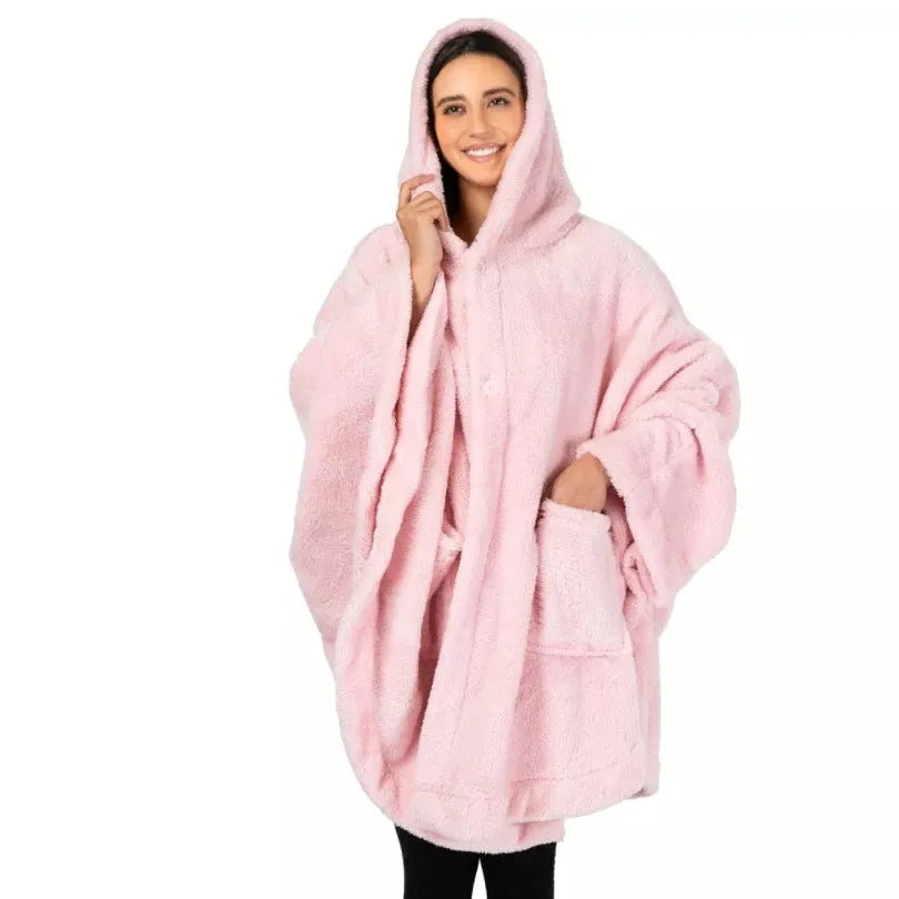 A thick pink hooded cloak bathrobe with long sleeves, shown on a hanger.