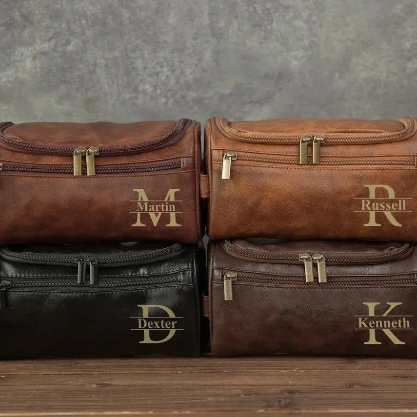 Men's black PU leather travel toiletry bag for grooming storage.