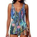 Women's printed triangle bikini and briefs swimsuit set in spandex fabric on a mannequin.
