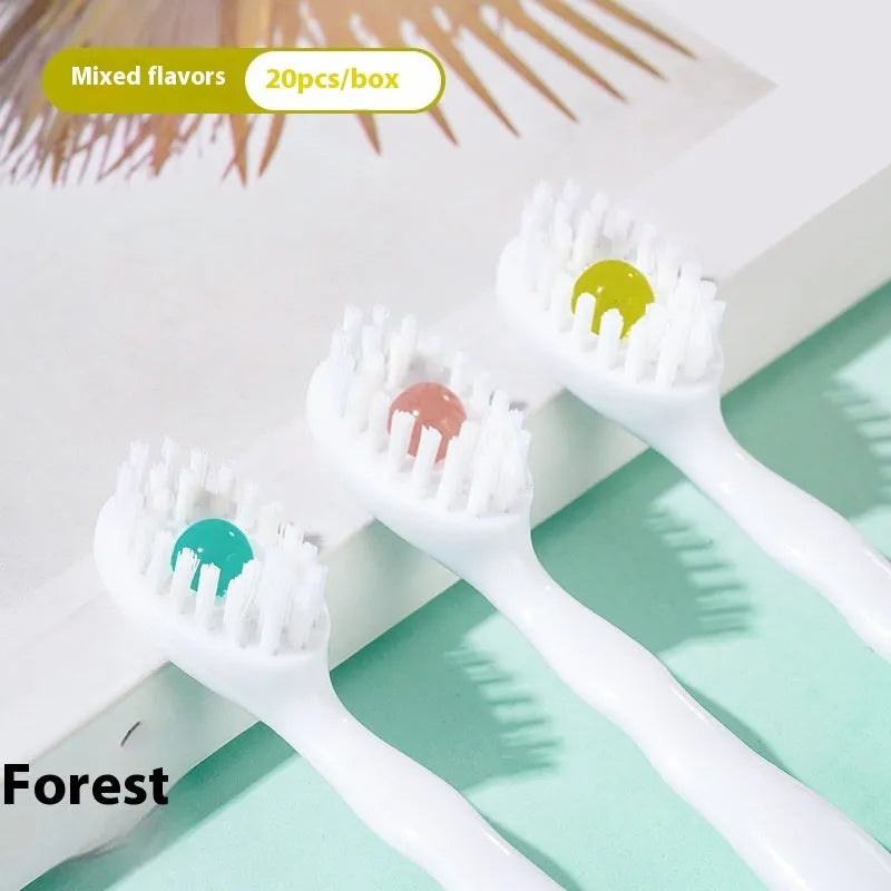 Box of 20 Bead disposable toothbrushes with integrated toothpaste in mint, peach, and plum green tea flavours.