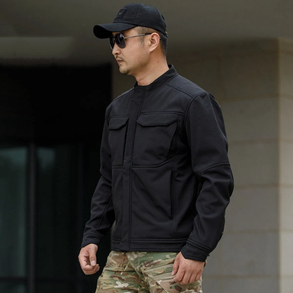 Soft shell tactical jacket for mountaineering and camping in black camouflage colour